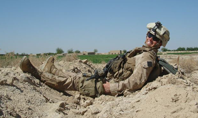 Kyle Fairchild taking a break while on patrol in Afghanistan